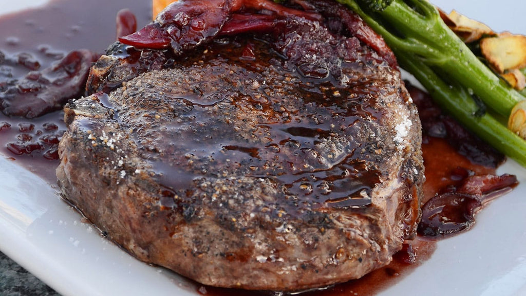 Rotisserie Prime Rib with Cognac Mushrooms and Pearl Onions