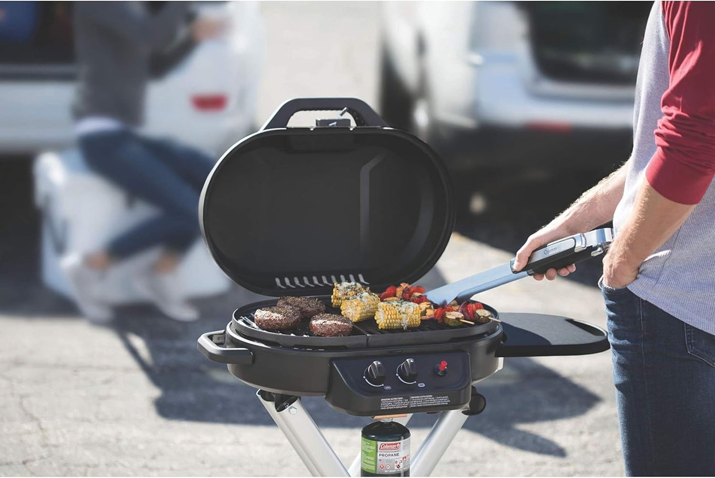 Coleman Roadtrip 225 Portable Stand-Up Propane Grill Gas Grill with Push-Button Starter Folding Legs & Wheels Side Table & 11000 Btus of Power for Camping Tailgating Grilling & More