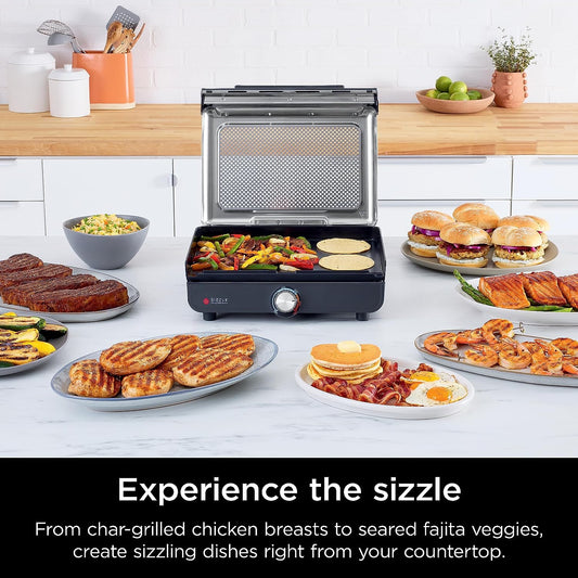 GR101 Sizzle Smokeless Indoor Grill & Griddle, 14'' Interchangeable Nonstick Grill and Griddle Plates, Dishwasher-Safe Removable Mesh Lid, 500F Max Heat, Even Edge-To-Edge Cooking, Grey/Silver
