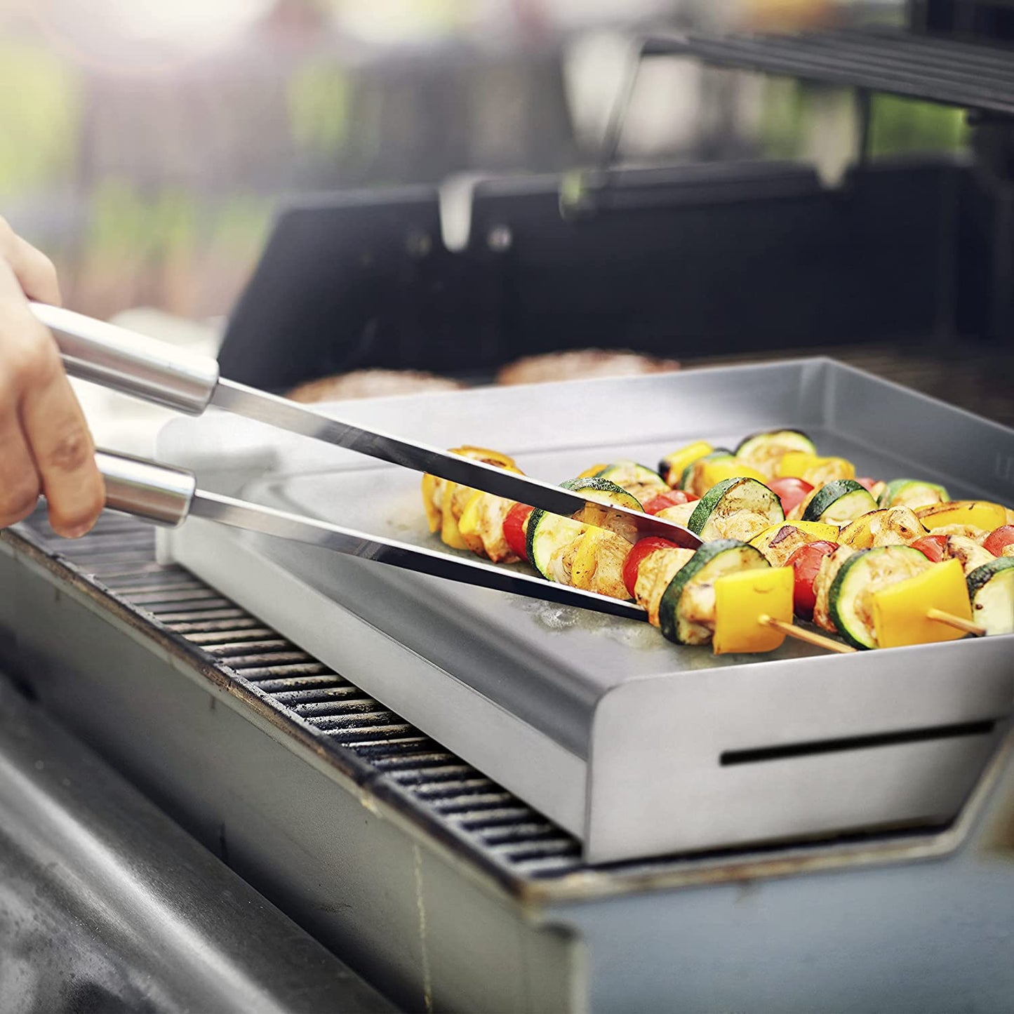 Sizzle-Q SQ180 100% Stainless Steel Universal Griddle with Even Heating Cross Bracing for Charcoal/Gas Grills, Camping, Tailgating, and Parties (18"X13"X3")