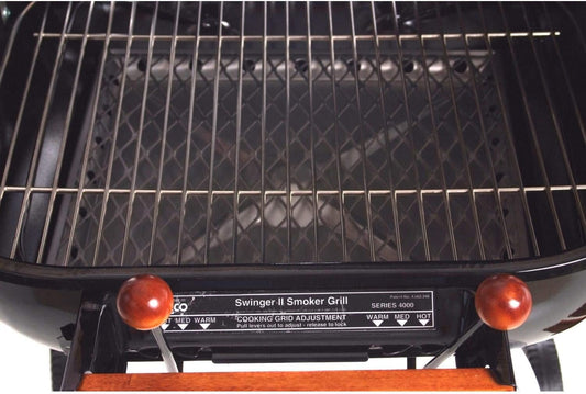Americana the Swinger with an Adjustable Six-Position Cooking Grid in Red