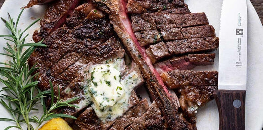 Succulent Herb-Crusted Prime Rib with Red Wine Sauce