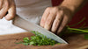 Why is a Wet Towel Placed Under the Cutting Board?