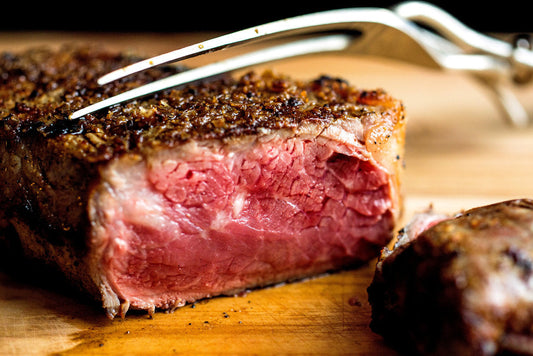Succulent Strip Steaks & Tomato-Blue Cheese Vinaigrette