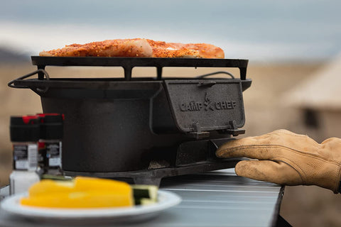 Image of Camp Chef Cast Iron Charcoal Grill - Small, Portable Charcoal Grill for Camping Gear
