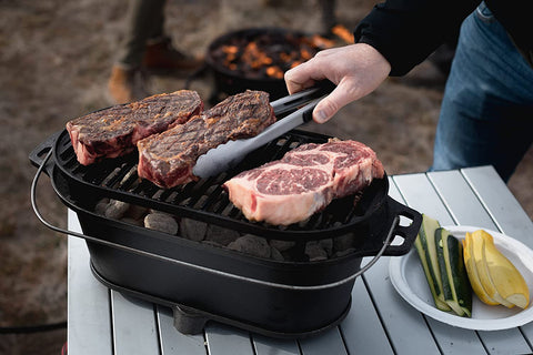 Image of Camp Chef Cast Iron Charcoal Grill - Small, Portable Charcoal Grill for Camping Gear